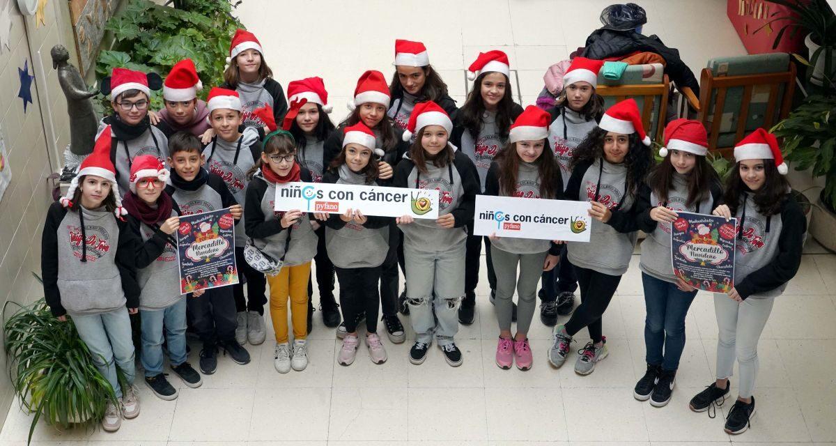 Niños de Valladolid montan un mercado navideño a favor de menores oncológicos